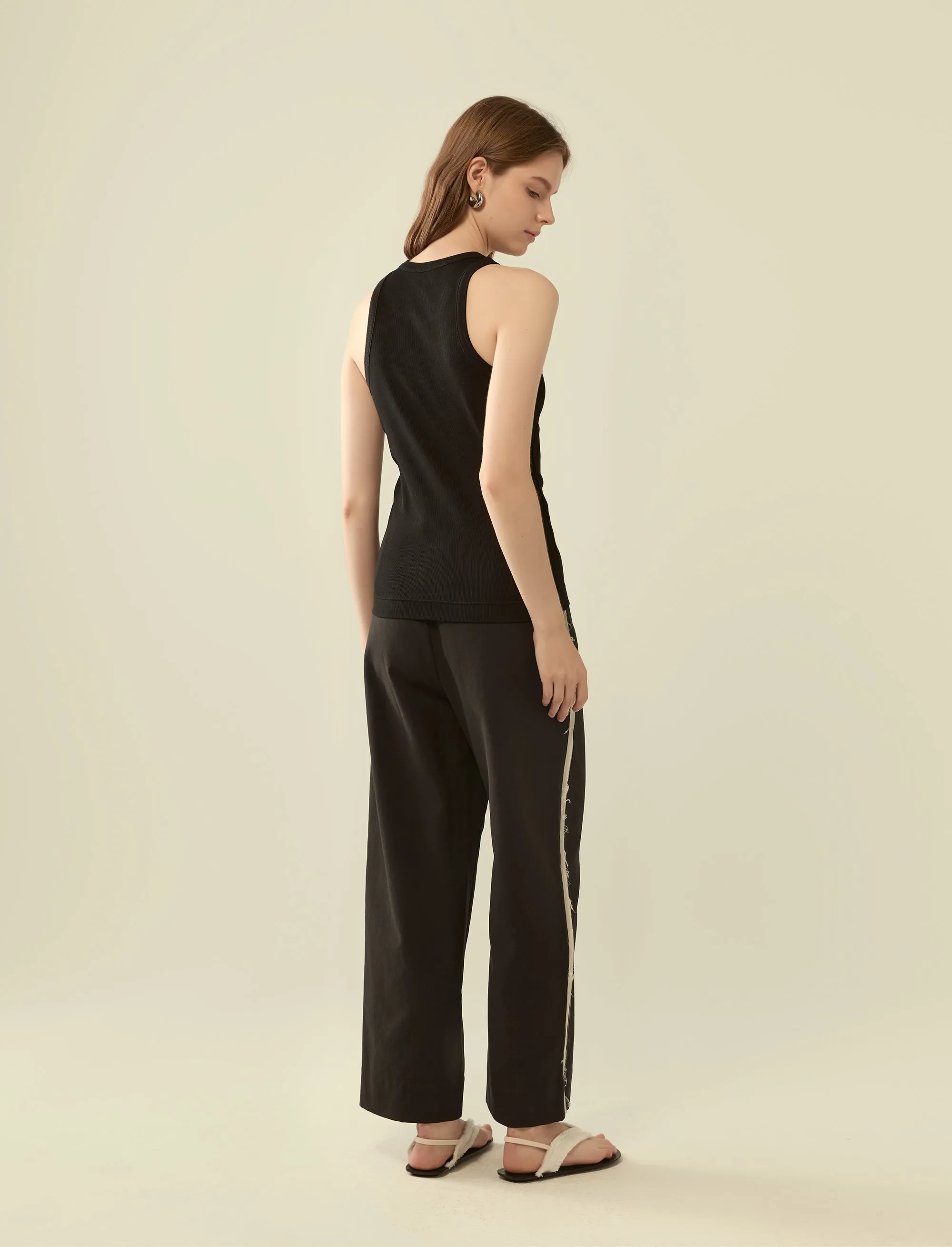 deconstructed exposed seam trousers