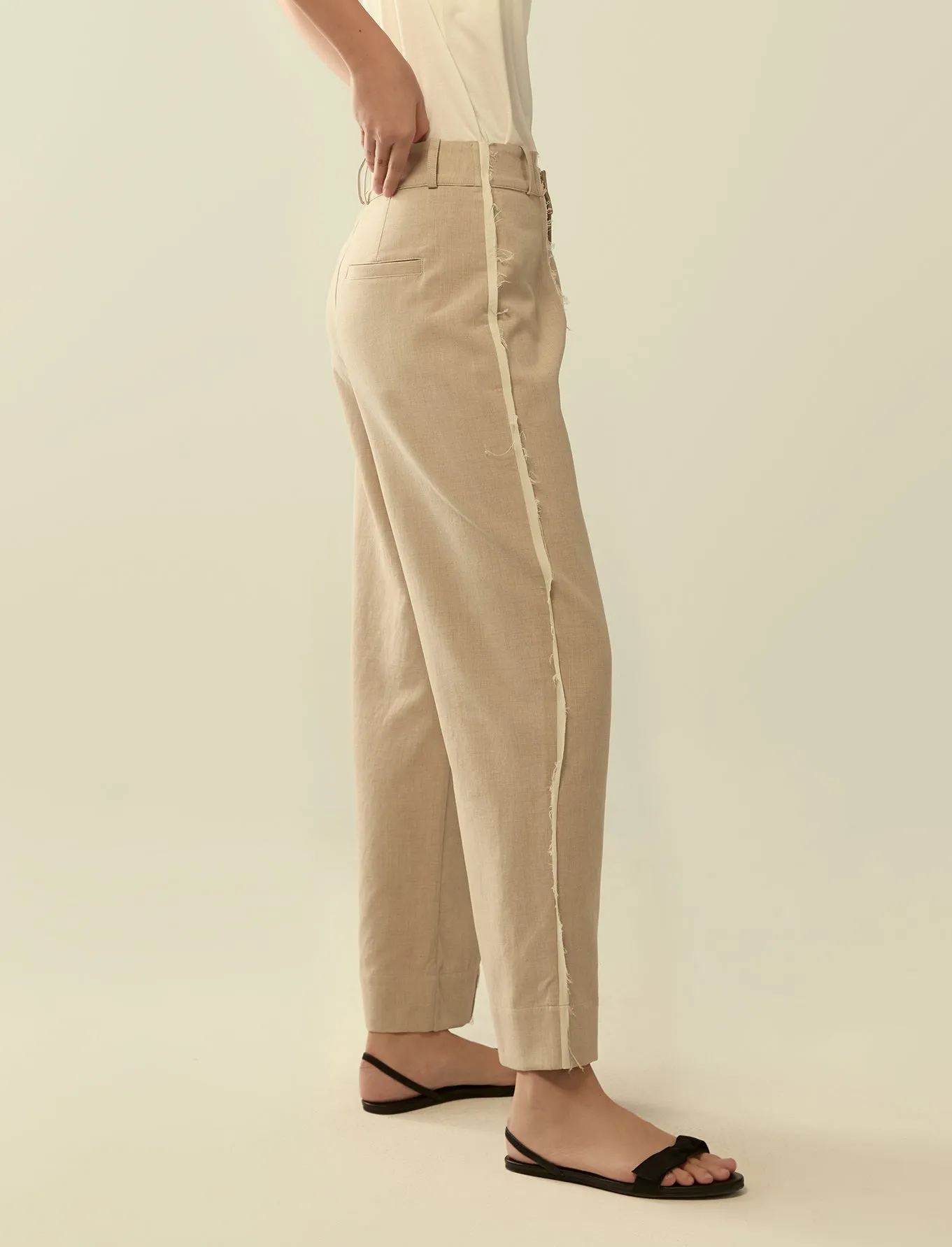 deconstructed exposed seam trousers