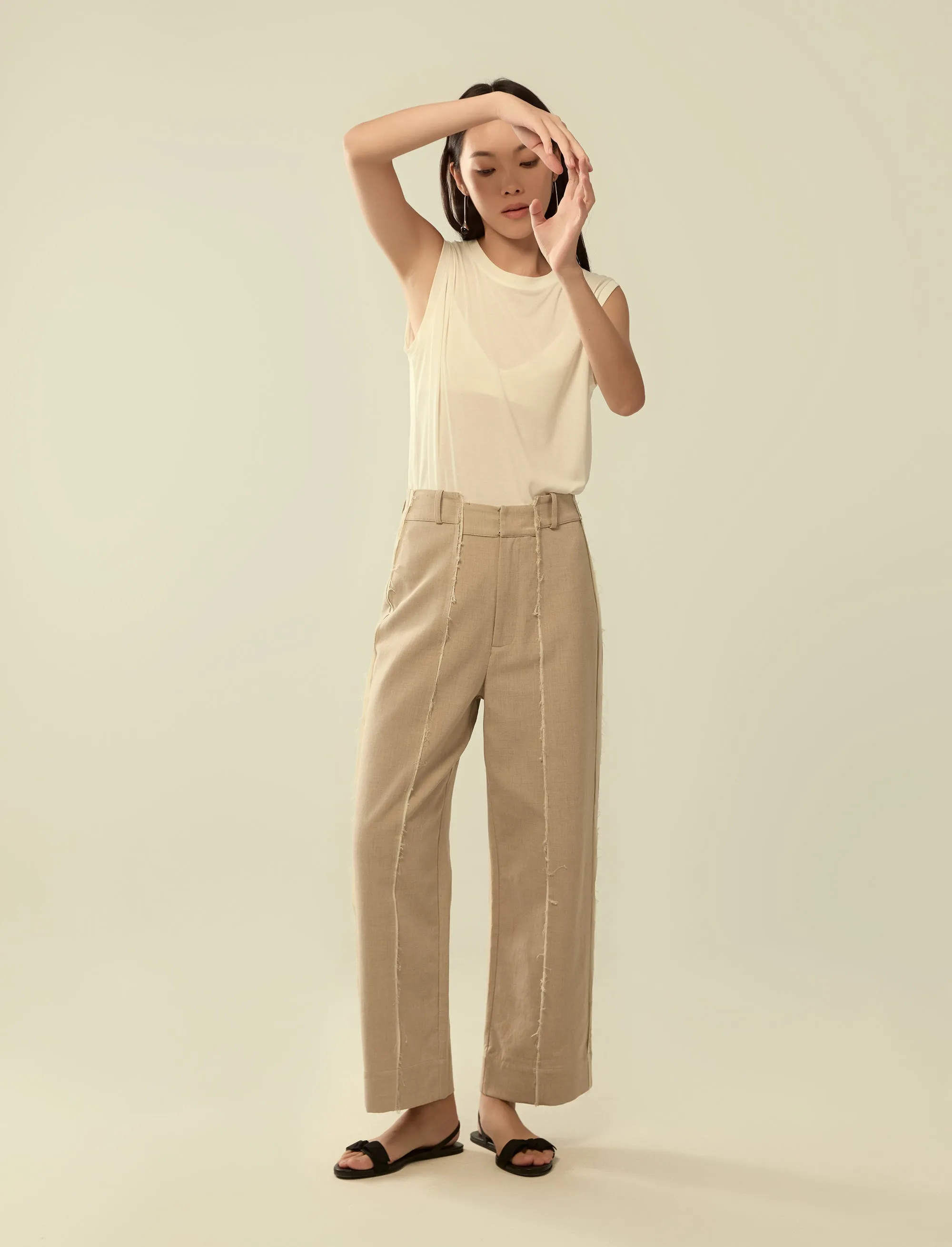 deconstructed exposed seam trousers